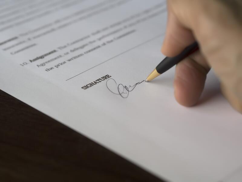 Person signing a document