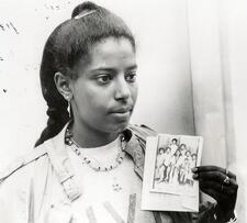 Ethiopian Jewish woman holding photograph. Around 1980. 