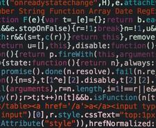 Close-up photo of computer code.