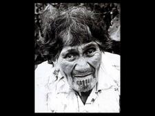 A woman with a traditional Maori moko tattoo on her chin