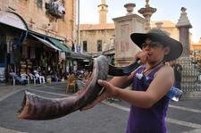 Child Blows Shofar in Old City