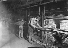 Putting Bottles into the Annealing Oven, an Indianapolis Glass Works, Indianapolis, Indiana, 1908