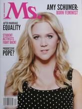 Amy Schumer wearing a polka dot sleeveless top on the cover of Ms. Magazine, the title in dark pink