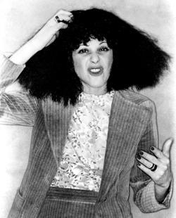 Gilda Radner as Roseanne Roseannadanna