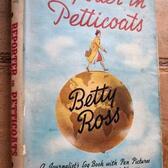 Book Cover of Betty Ross's book "Reporter in Petticoats"