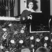 Elaine DeLott Giving Her Hebrew School Valedictory Address at Temple TiFereth, 1952