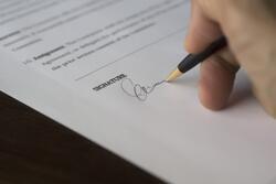 Person signing a document