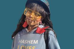 Elisheva Rishon wearing her brand’s “Hashem Loves You” hoodie 