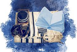 Collage of tallit, a kippah, and other Jewish ritual objects.