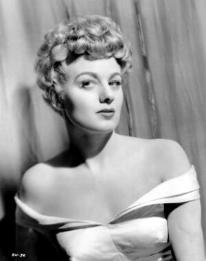 Portrait of Shelley Winters in an off shoulder formal dress