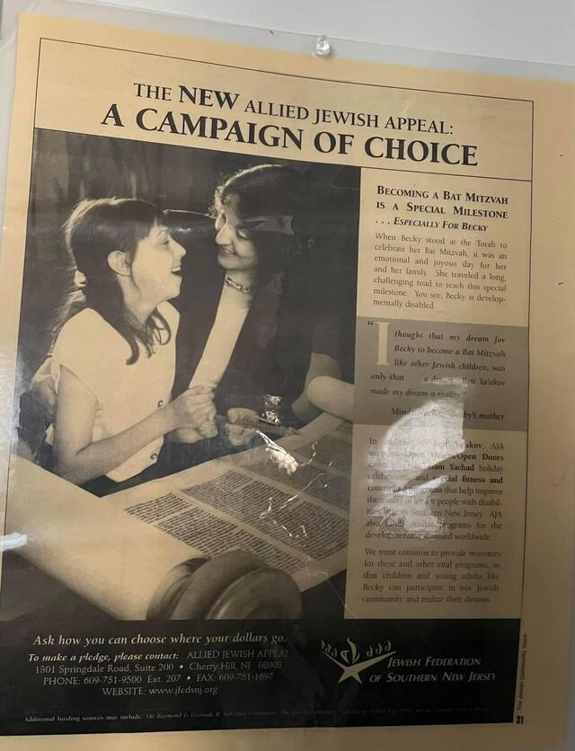 Newspaper clipping with photo of Allison's sister Becky and their mother at the bimah