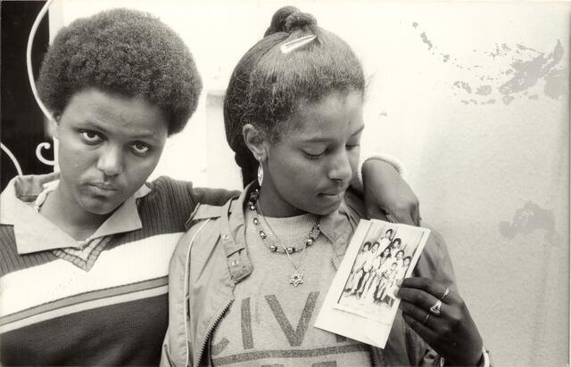 Ethiopian Jewish woman holding photograph. Around 1980.