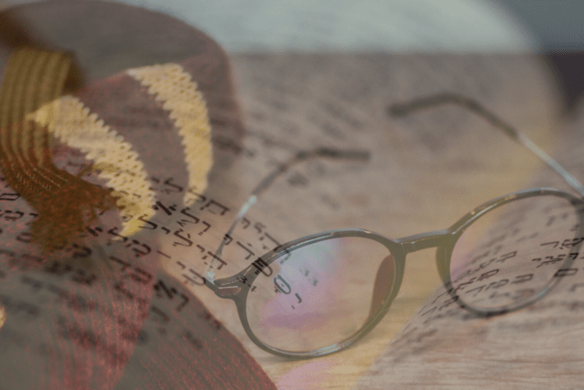 Composite image of Hebrew and Harry Potter glasses / scarf