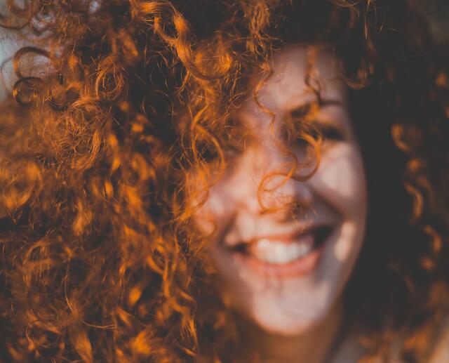 A woman with curly hair